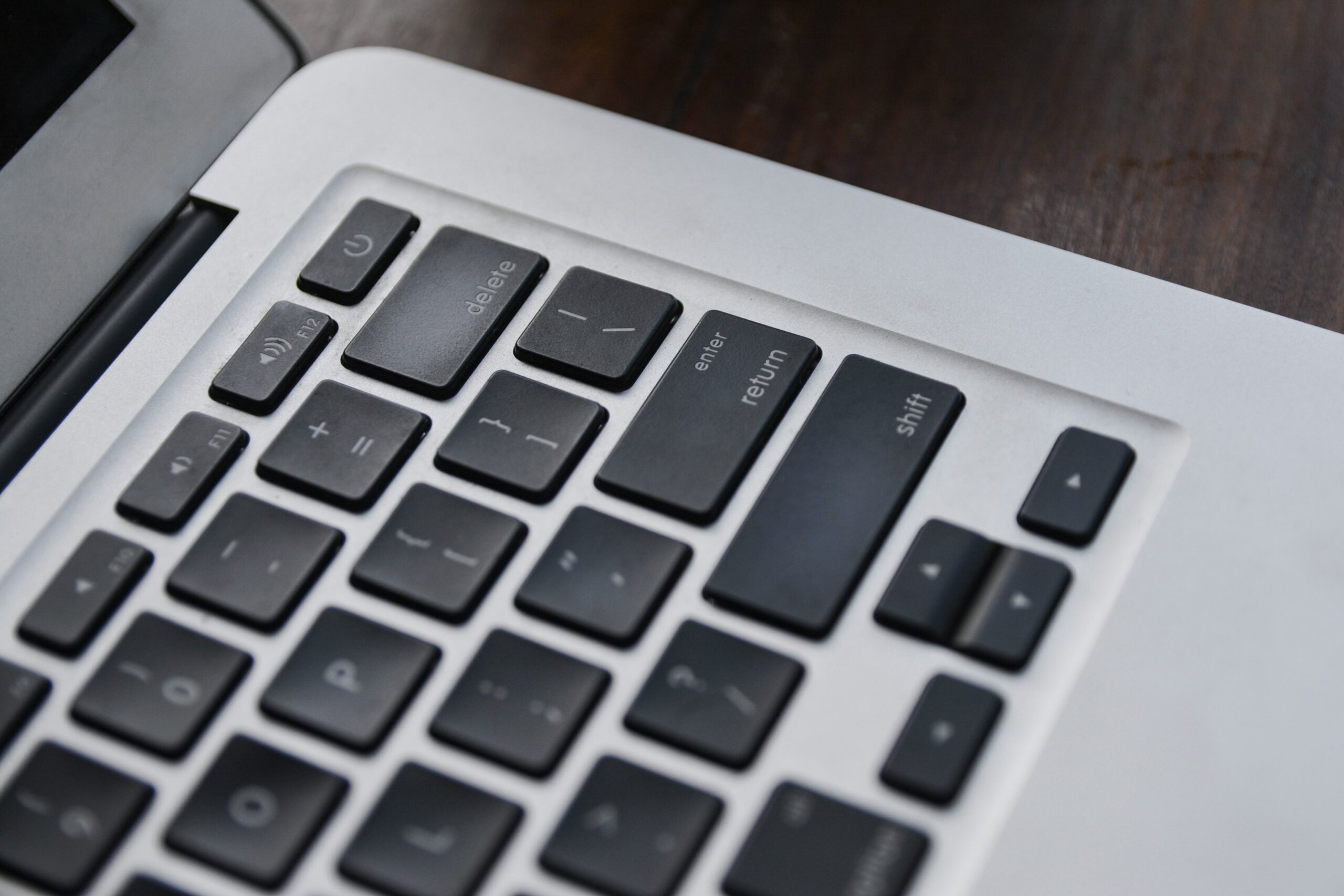 a laptop computer keyboard and a laptop computer