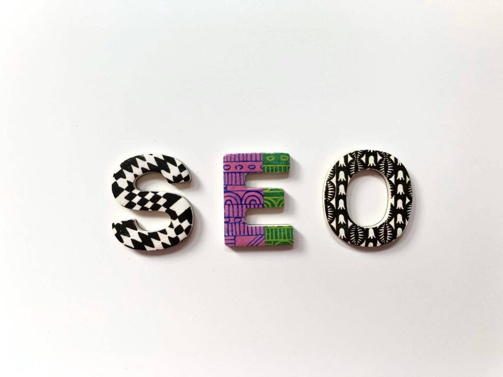 Colorful decorative letters spelling "SEO" on a white background.